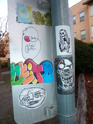 graffiti on pole on Stanford campus